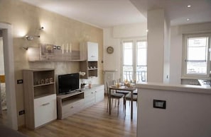 Living area - Carrara Hospital Home. A bright and modern apartment located at Via delle Cave 9 (Bergamo)