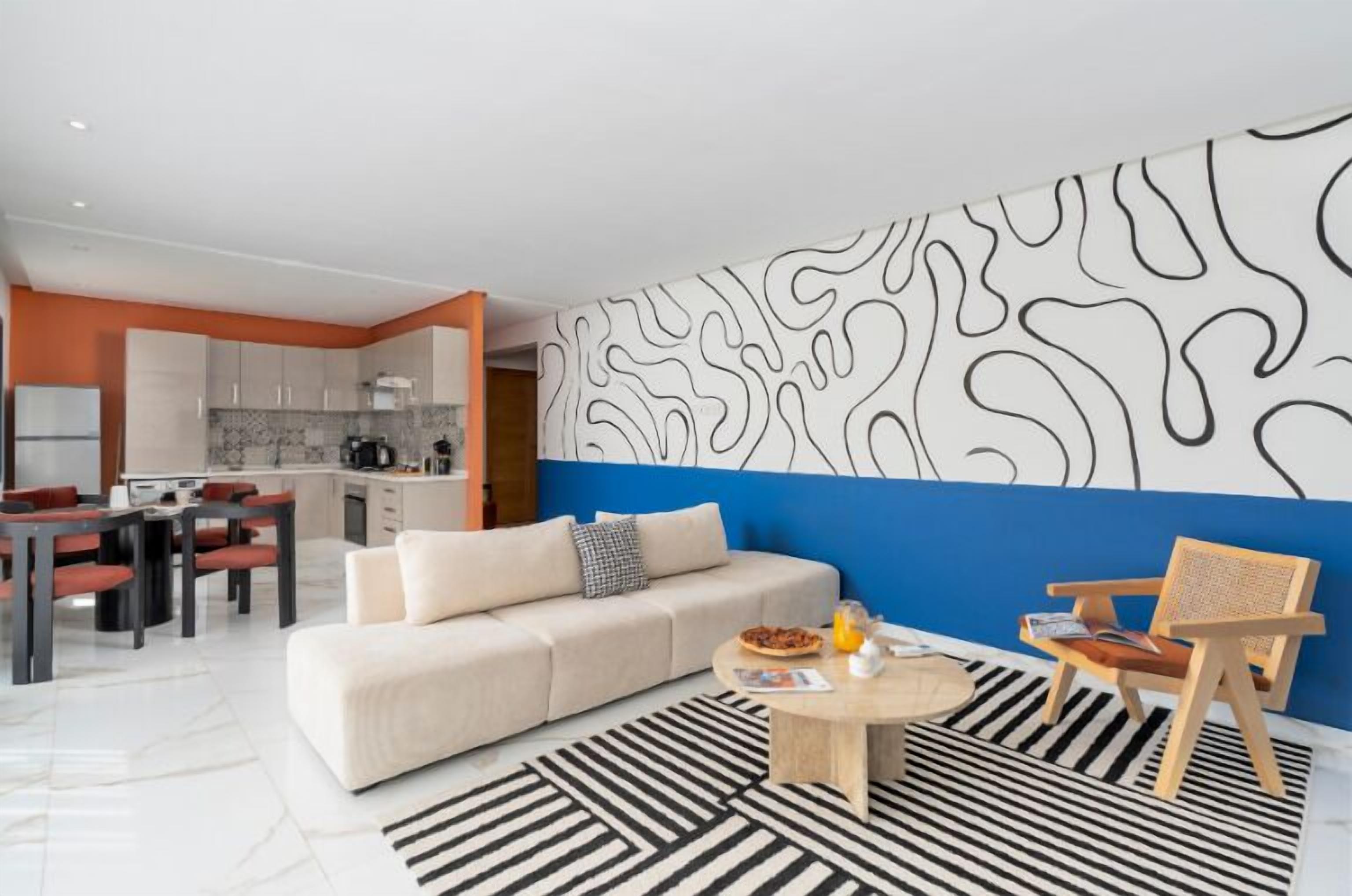 Apartment, City View | Living area | 121-cm Smart TV with digital channels, pay movies