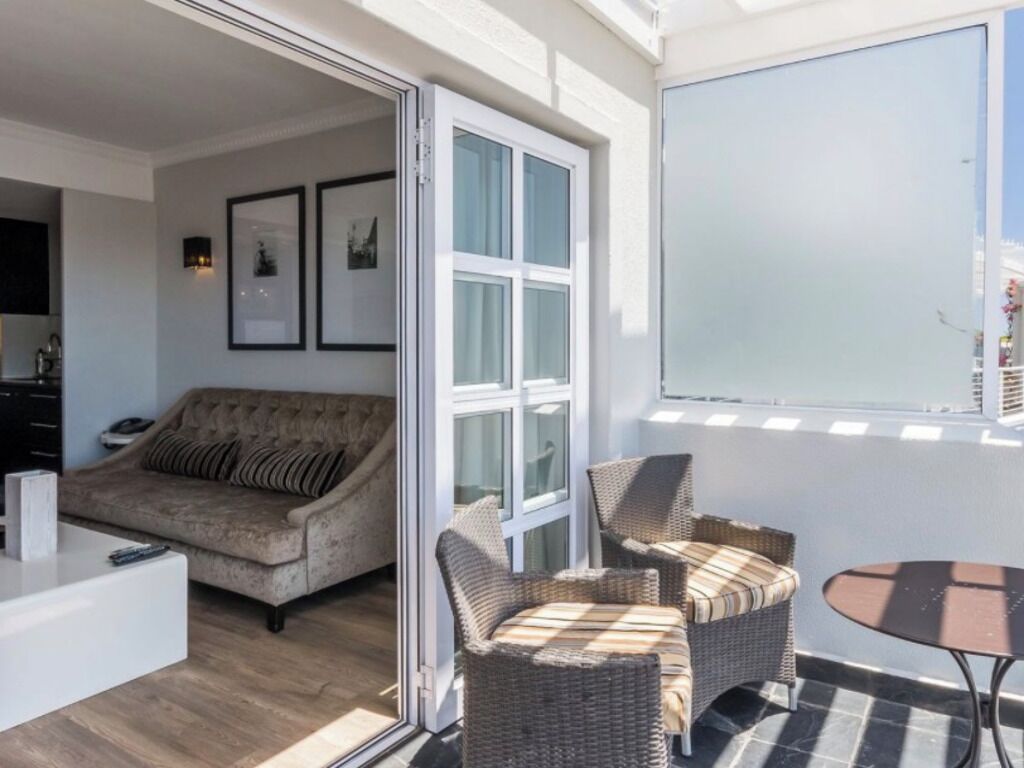 Apartamento, 1 quarto, acessível, piscina particular | Sala de estar