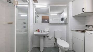 Shower, towels, soap, toilet paper