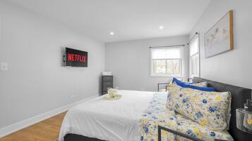 1 bedroom, desk, iron/ironing board, travel crib