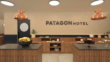 A hotel reception area with a wooden reception desk, a wall-mounted sign reading 'PATAGON HOTEL,' and a fruit bowl on the counter.