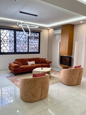 Living area - Paros Cosy House - Écrin Stay - Pool and Gym - Bright T2 (Dakar)