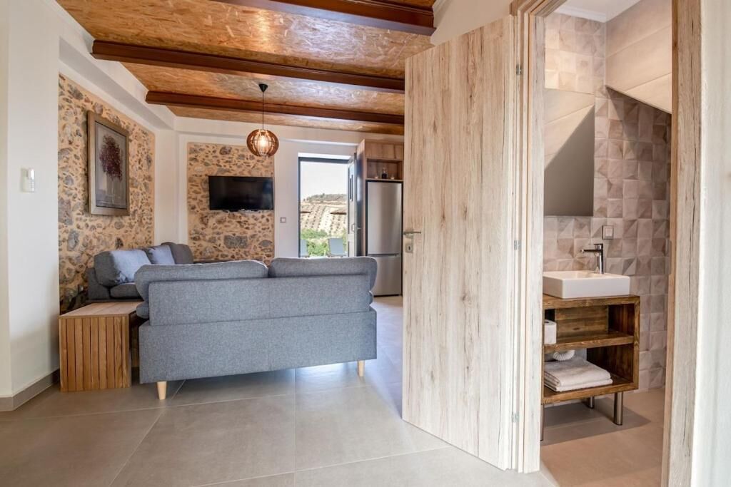 Deluxe Villa, Balcony, Garden View | Living area