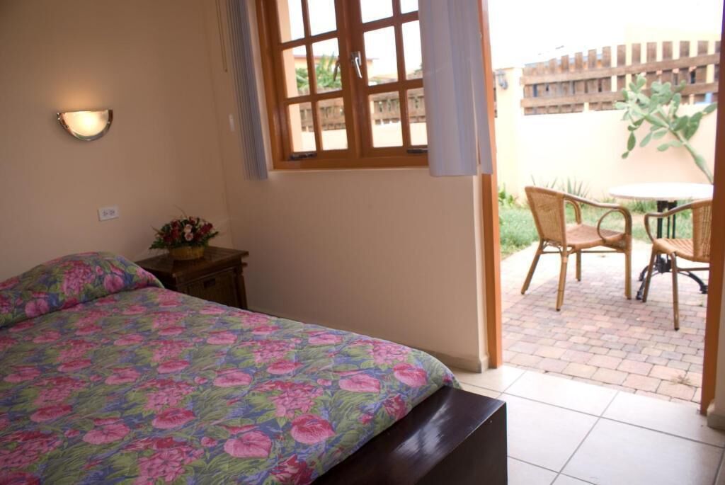 Deluxe Apartment, Balcony, Garden View | In-room safe, iron/ironing board, free WiFi
