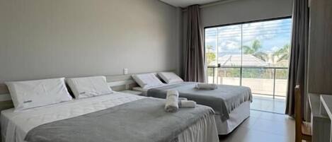 Quadruple Room, City View | Desk, laptop workspace, free WiFi, bed sheets