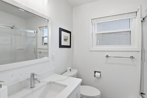 Shower, towels, soap, toilet paper