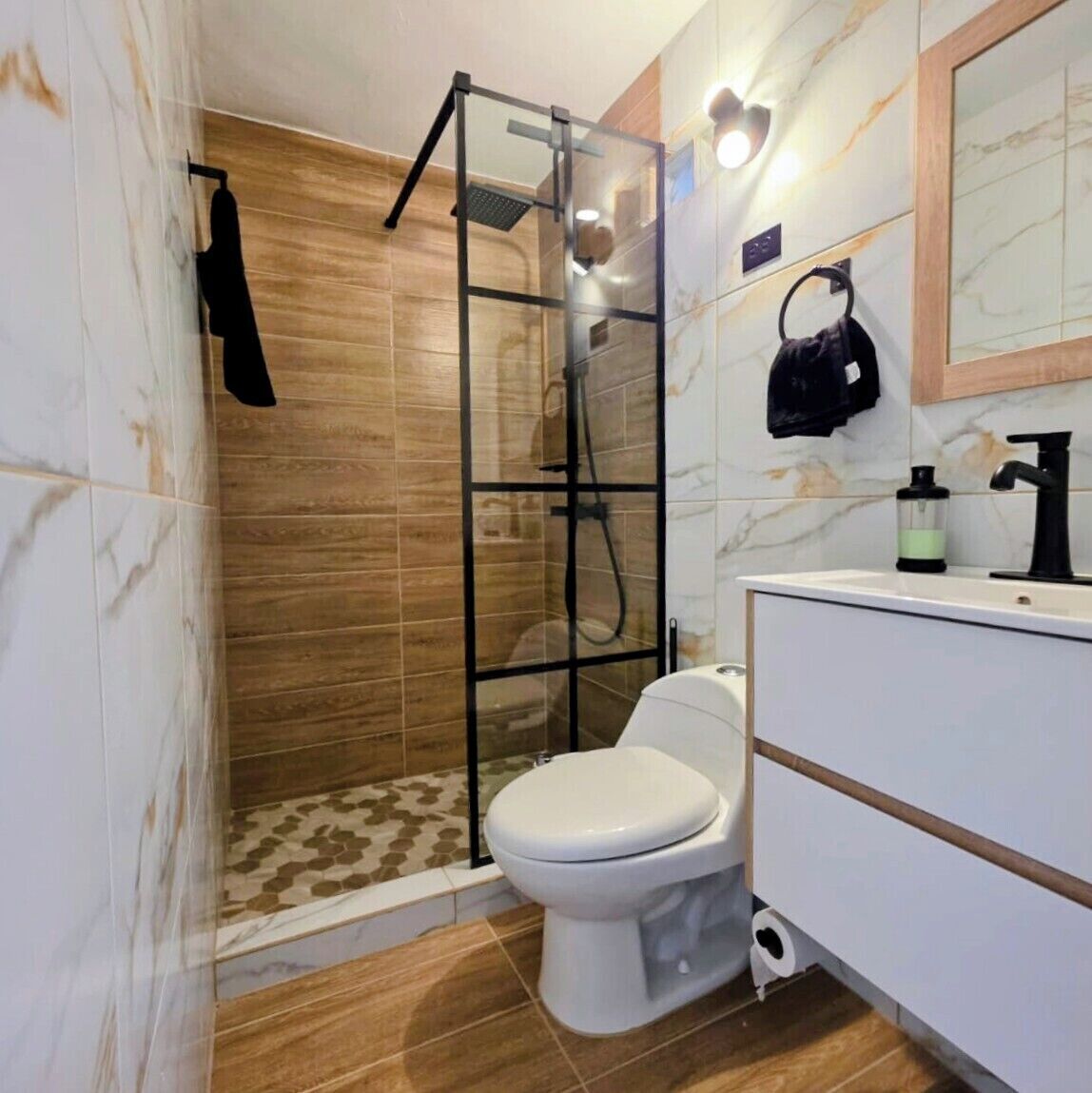 Shower, bidet, towels, soap