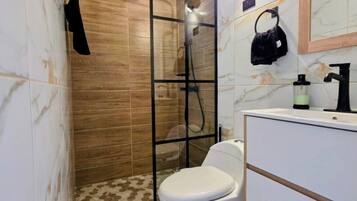Shower, bidet, towels, soap