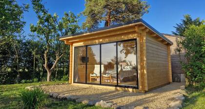 Private, air-conditioned log cabin, with field views, own garden and shower room