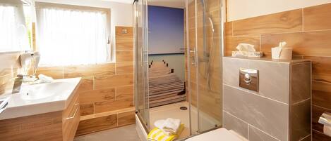 Shower, hair dryer, towels