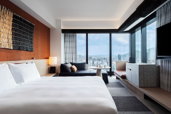 Deluxe Room, 1 King Bed with Sofa bed | Minibar, in-room safe, desk, blackout curtains