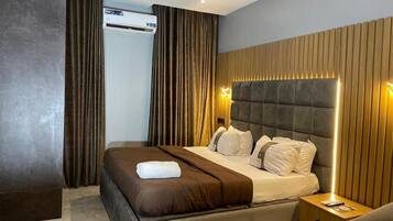 Economy Apartment, Balcony, City View | Desk, laptop workspace, blackout curtains, soundproofing