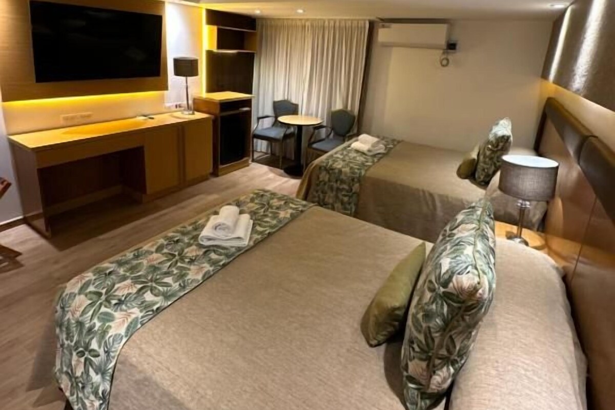 Quarto triplo superior | Wi-Fi de cortesia, roupa de cama