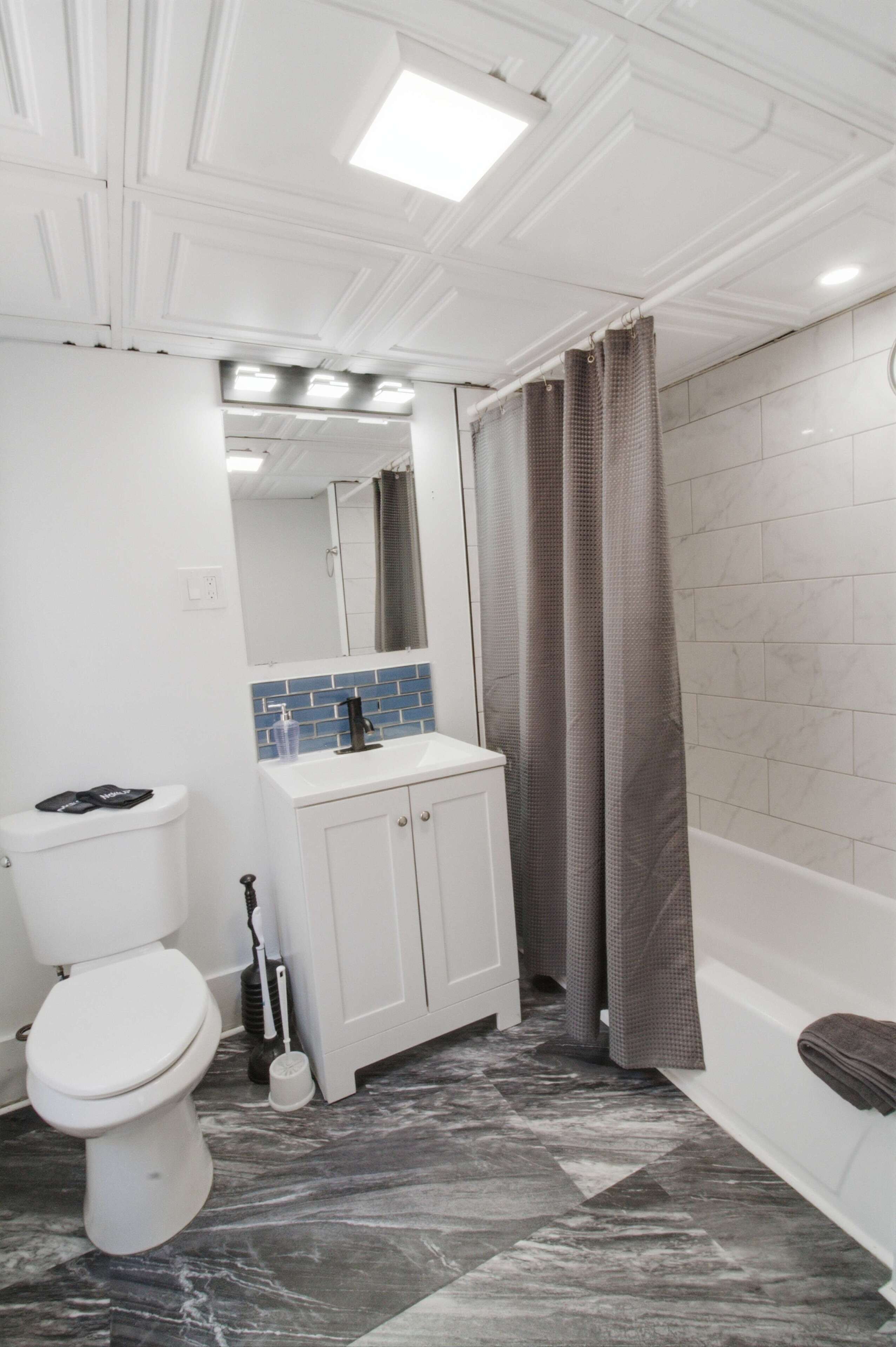 Shower, hair dryer, towels, shampoo