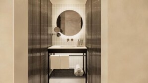 A bathroom with a round mirror, a sink, and a towel rack. - Esperanca Hotel Braga Vignette Collection By Ihg (Braga)