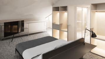 Un dormitorio moderno con cama, televisor, escritorio y estanterías empotradas.