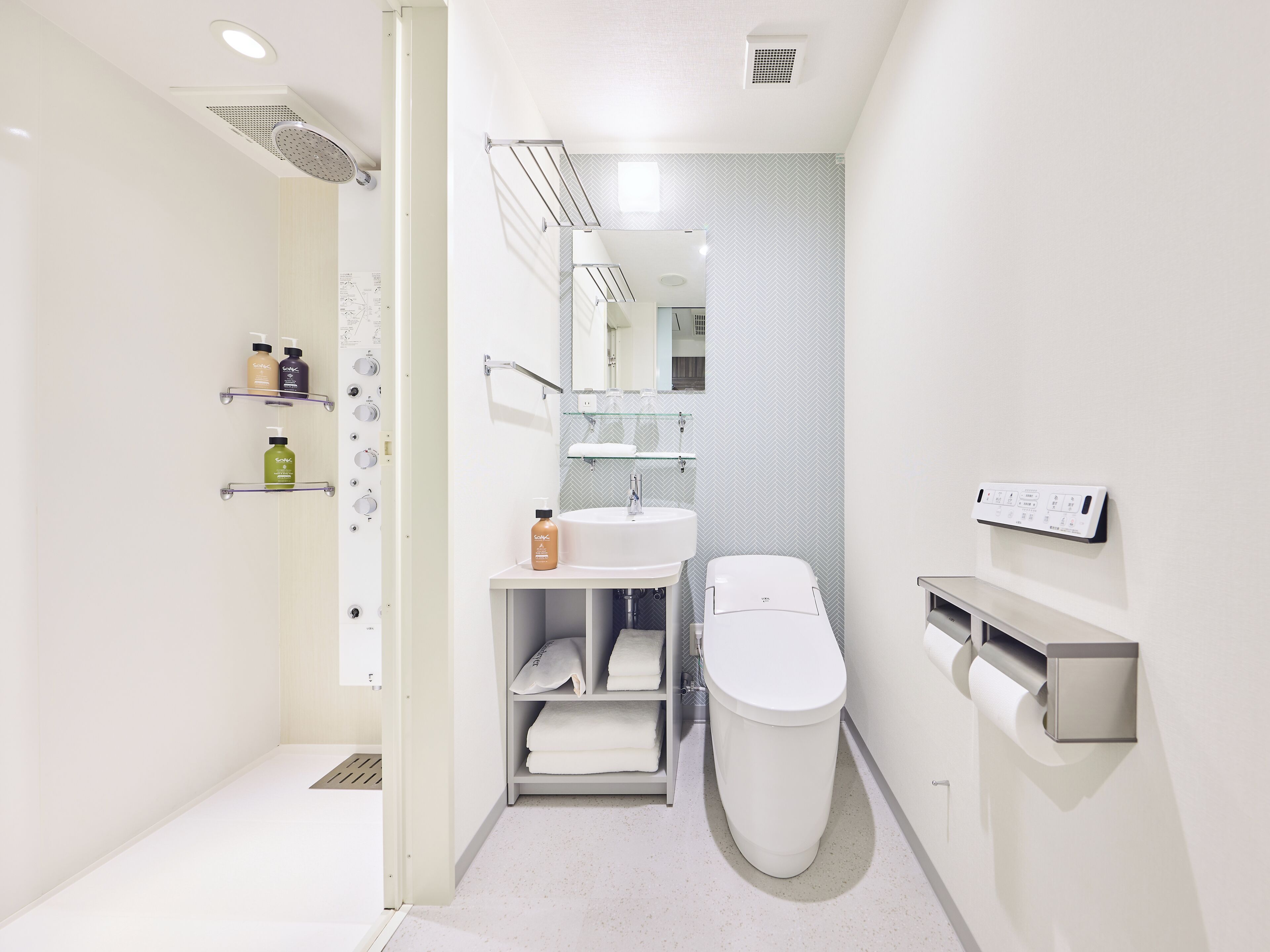 Rainfall showerhead, hair dryer, slippers, towels
