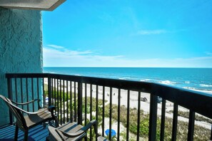 A balcony with a view of the ocean and beach. - 2BR Oceanfront Full Kitchen free Waterprk sleeps 7 (Myrtle Beach)