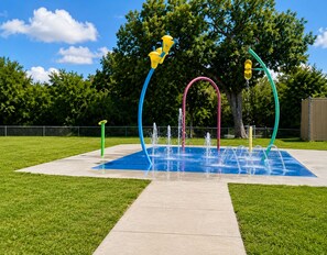 A water play area with multiple fountains and colorful structures. - Military-Friendly 3BR 2 BA Schertz Retreat Near Randolph AFB Sleeps 8 (Schertz)
