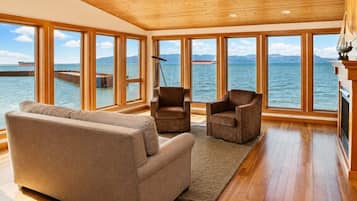 TV, fireplace, books, music library