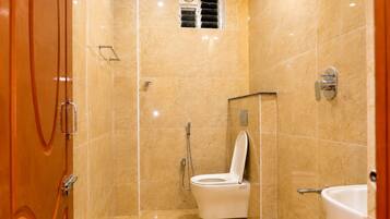 Separate tub and shower, towels, soap, shampoo