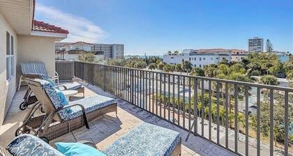 4-bedroom townhome with pool and steps to beach close to village