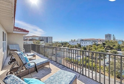 4-bedroom townhome with pool and steps to beach close to village