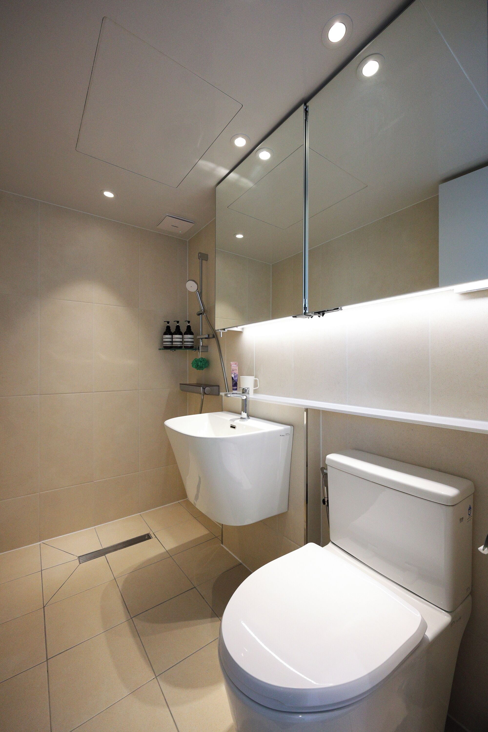 Shower, hair dryer, slippers, towels