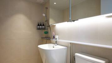 Shower, hair dryer, slippers, towels