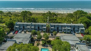A beachfront motel with multiple-story buildings, a swimming pool, and a beach view. - Ocean Club 11 Oceanfront
BRAND NEW to rental market
Steps to Beach/Pool/Coligny (Hilton Head Island)