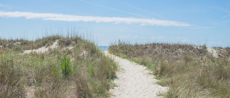 On the beach, sun-loungers, beach towels