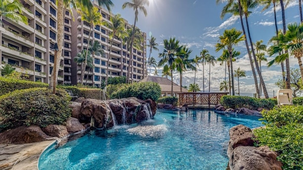 A resort with a pool, palm trees, and a multi-story building. - Kaanapali Alii-1 Bedroom Ocean Views (Lahaina)