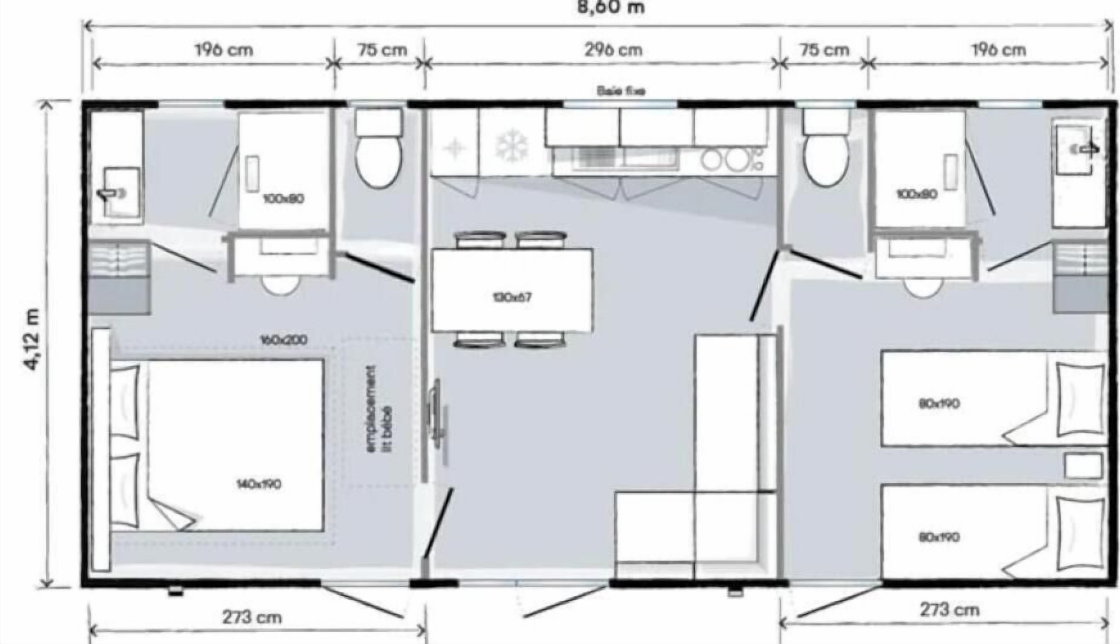 Un plan d’étage d’une chambre d’hôtel comprenant un lit, une salle de bain, un coin cuisine et un espace repas.