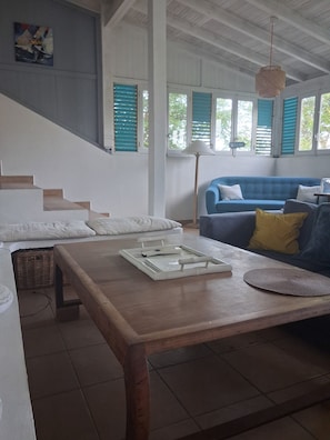 Living area - An architect-designed family home nestled in the treetops near the beach. (Grand-Bourg de Marie-Galante)
