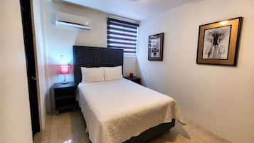 Barrio inn Morelos Suite - #23 Cama matrimonial | Minibar, tabla de planchar con plancha y wifi gratis