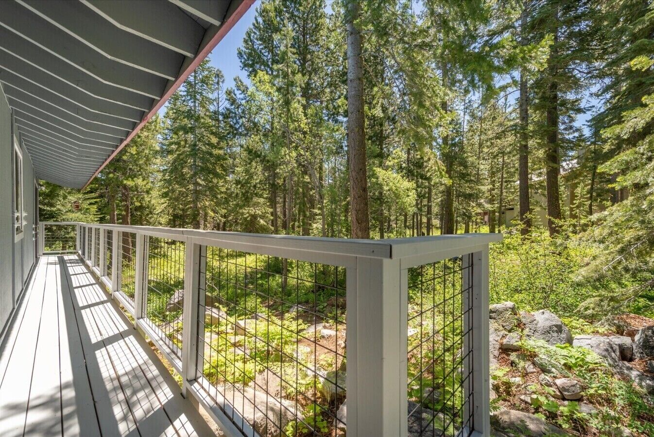 View looking towards backyard from rear deck