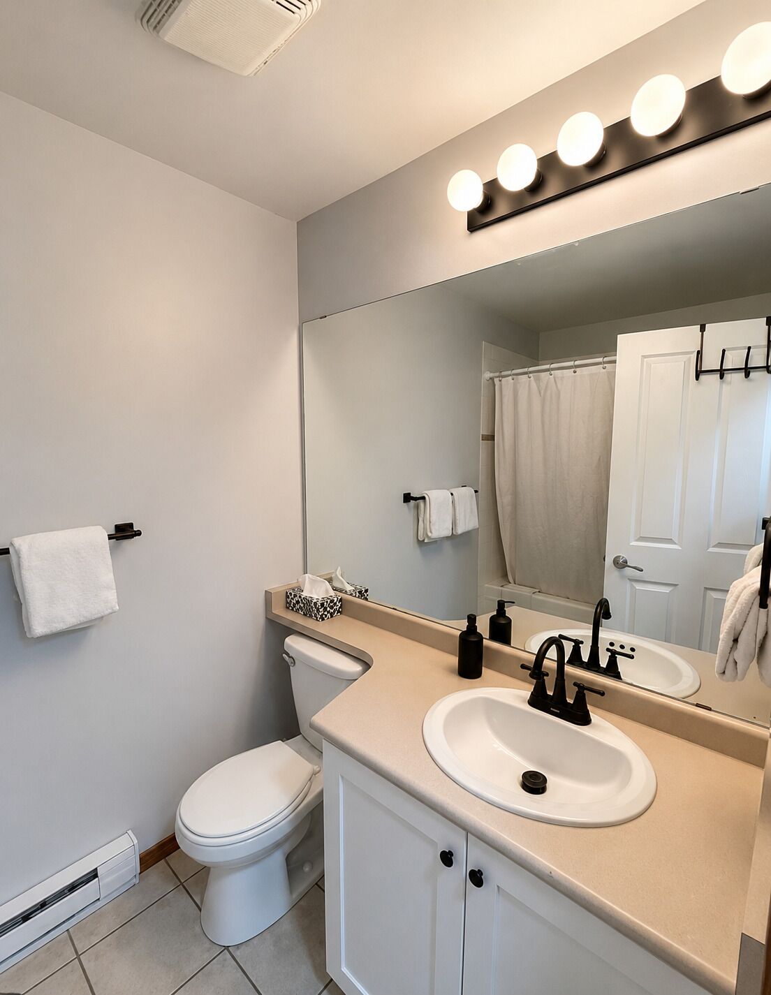 Hair dryer, towels, soap, toilet paper