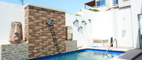 Outdoor pool, pool umbrellas, pool loungers