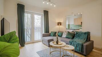 Apartment, Private Bathroom, Canal View | Living area