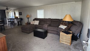 A spacious living room with a sectional sofa, ottoman, and a small wooden table. - Serene two bedroom mobile home with AC in Murphy, ID.
Outdoor recreation galore! (Murphy)