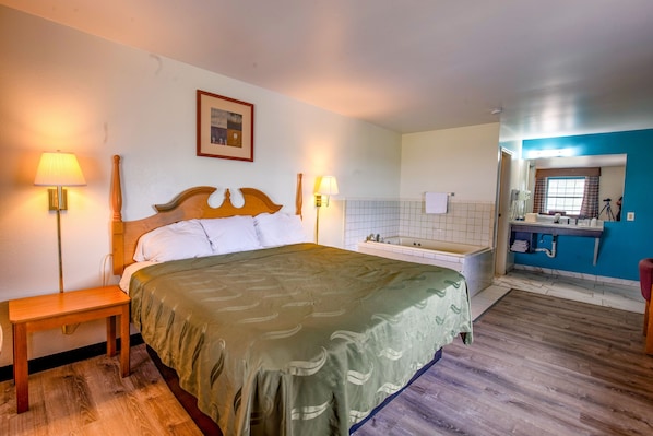 Suite Deluxe, 1 cama de matrimonio grande, no fumadores, bañera de hidromasaje | Wifi gratis y ropa de cama