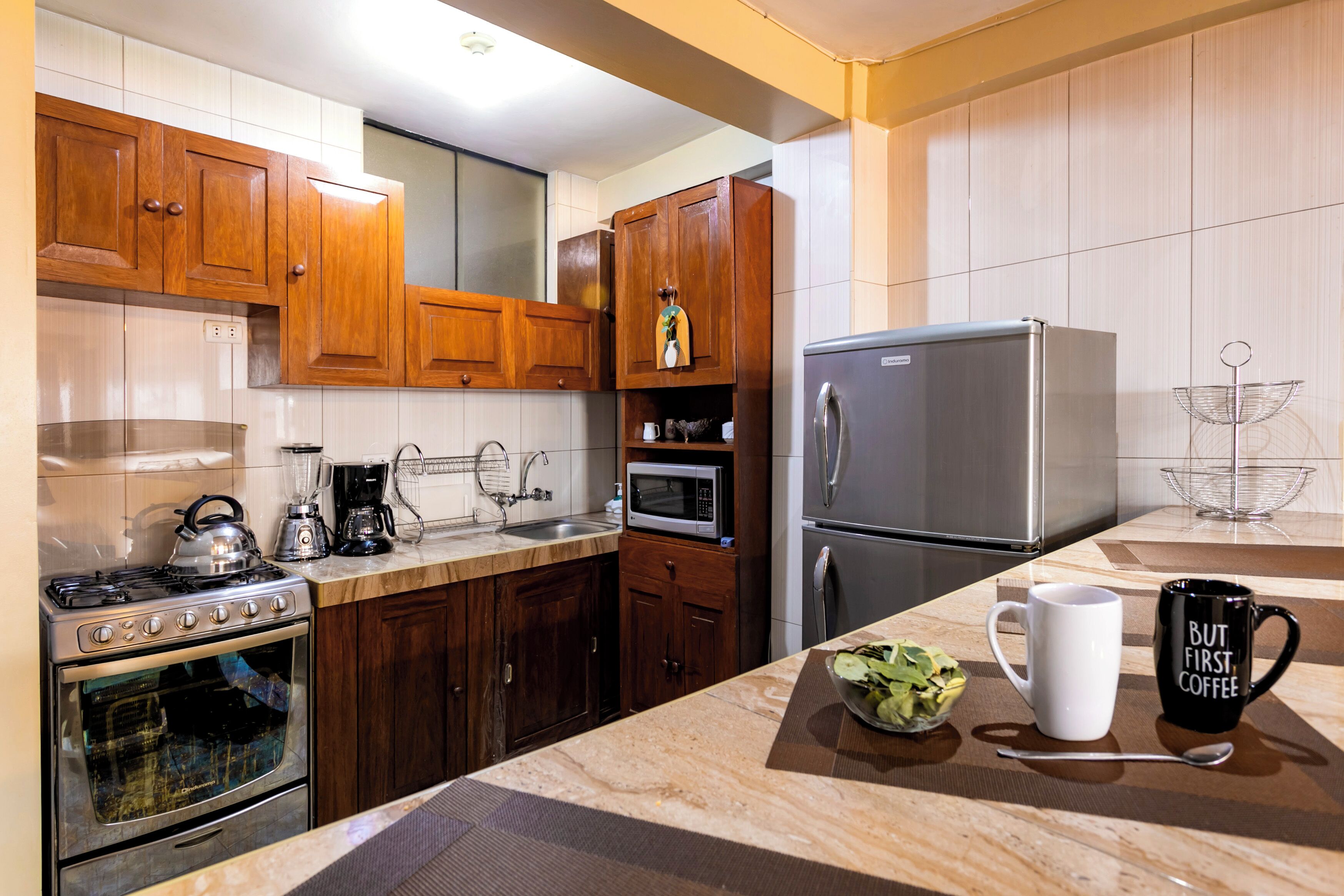 Coffee/tea maker, fridge, microwave, oven