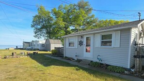Exterior - Lake Huron Freebird - Cozy 2BR Cottage with Beach Access & Golf Nearby (Au Gres)