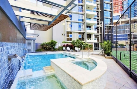 Outdoor pool. The Gilded Gallery I Art-Inspired Luxe