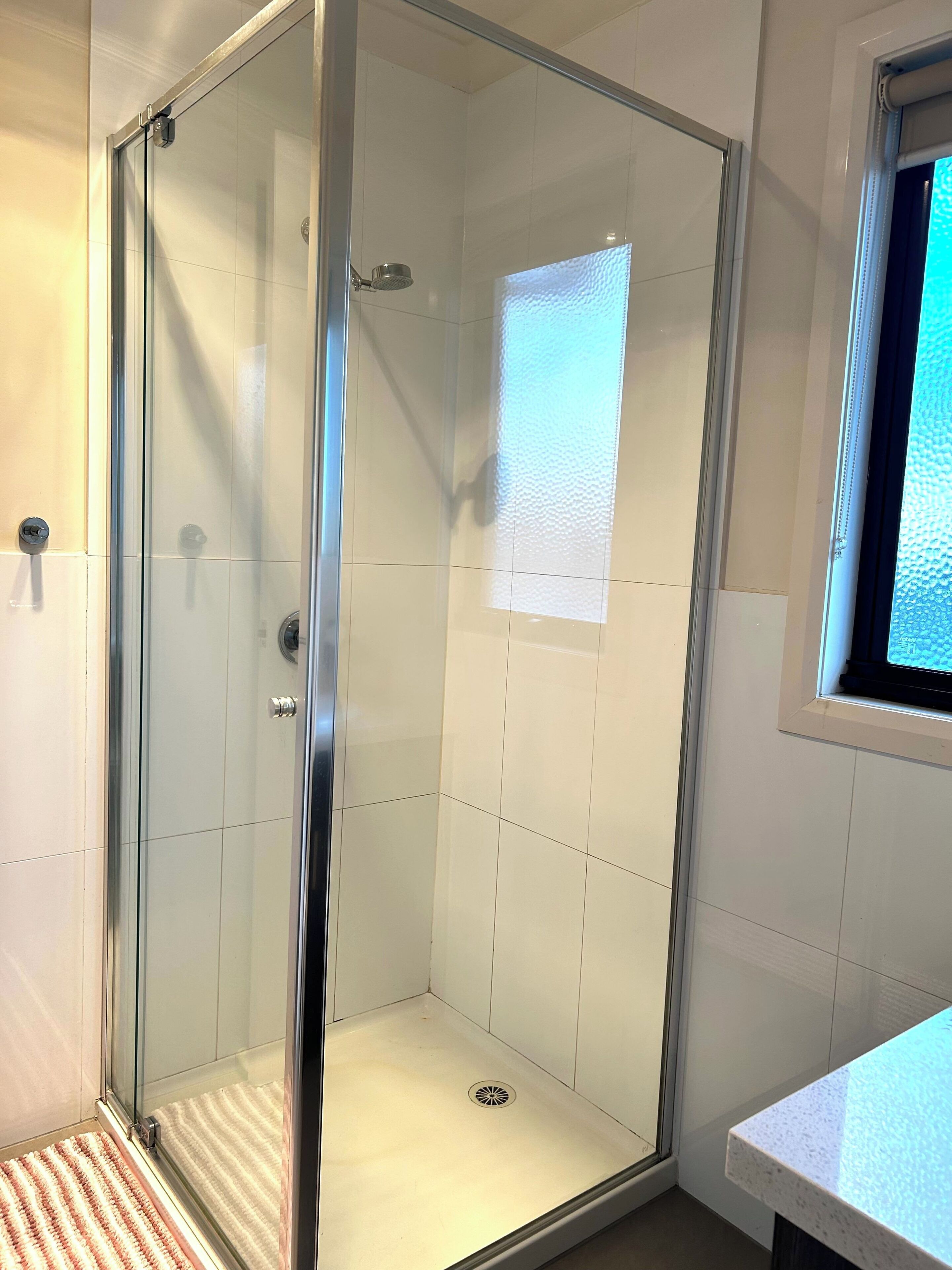 Shower, towels, soap, toilet paper