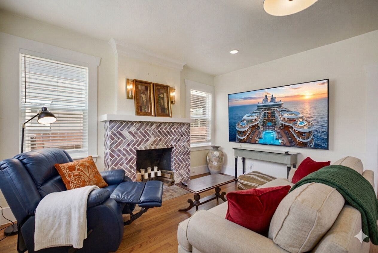 Smart TV, fireplace, books, offices