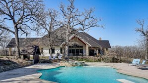 A house with a swimming pool, a fenced yard, and a large tree. - Post Oak Estate - Pool, Barn, 2 Guest Homes, 16 Ac (Cleburne)