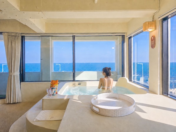 Luxury Suite, Ocean View | Laptop workspace, blackout curtains, free WiFi, bed sheets
