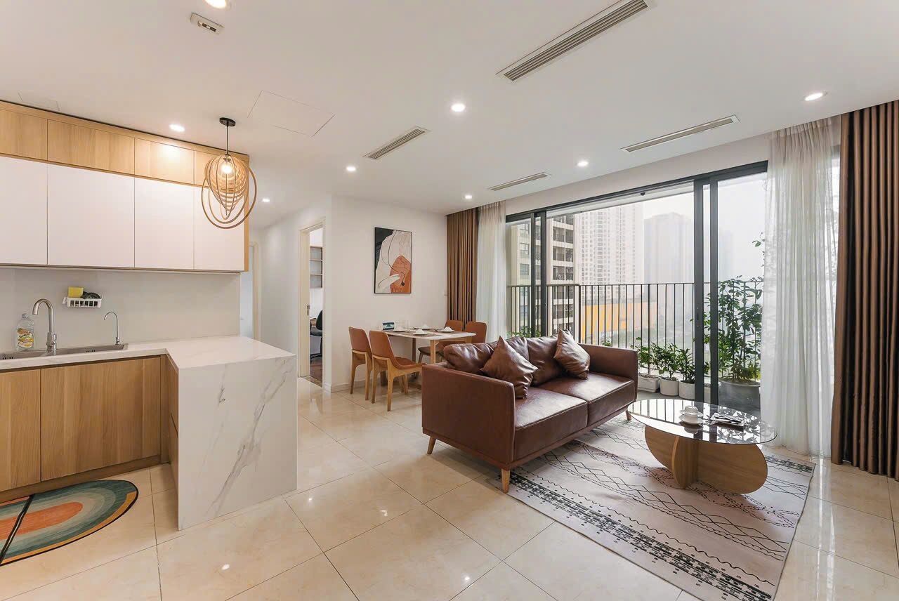 Business Apartment, 2 Bedrooms, City View, Tower | Living area | 60-inch Smart TV with digital channels, pay films
